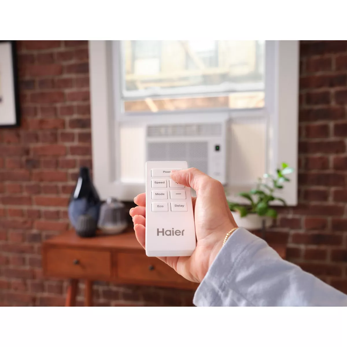 Haier 6000 BTU 115V Electronic Window Air Conditioner with Remote and Eco Mode QHNE06AA