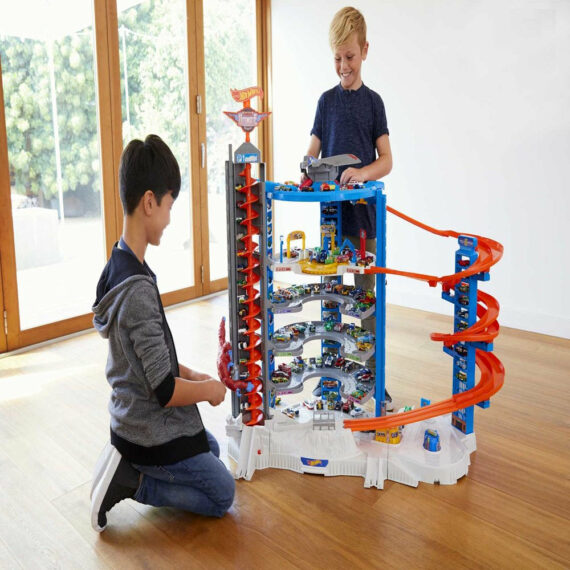 Hot Wheels Super Ultimate Garage Track Set with 4 Cars & Jet Plane, Over 3ft Tall, 140+ Car Storage, Motorized Elevator