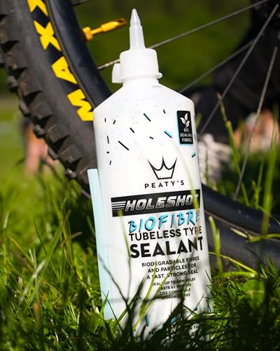 Peaty’s Holeshot Biofibre Tubeless TIre Sealant  Fast Acting Puncture Repair  Seals up to 6mm Holes for MTB  Road and Gravel Bikes  uses Biodegradable Sealing Fibres  1 Liter