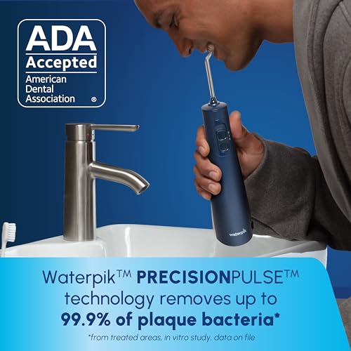 Waterpik Cordless Pulse Rechargeable Portable Water Flosser for Teeth Gums Braces Care and Travel with 2 Flossing Tips Waterproof ADA Accepted WF-20 Blue Packaging May Vary